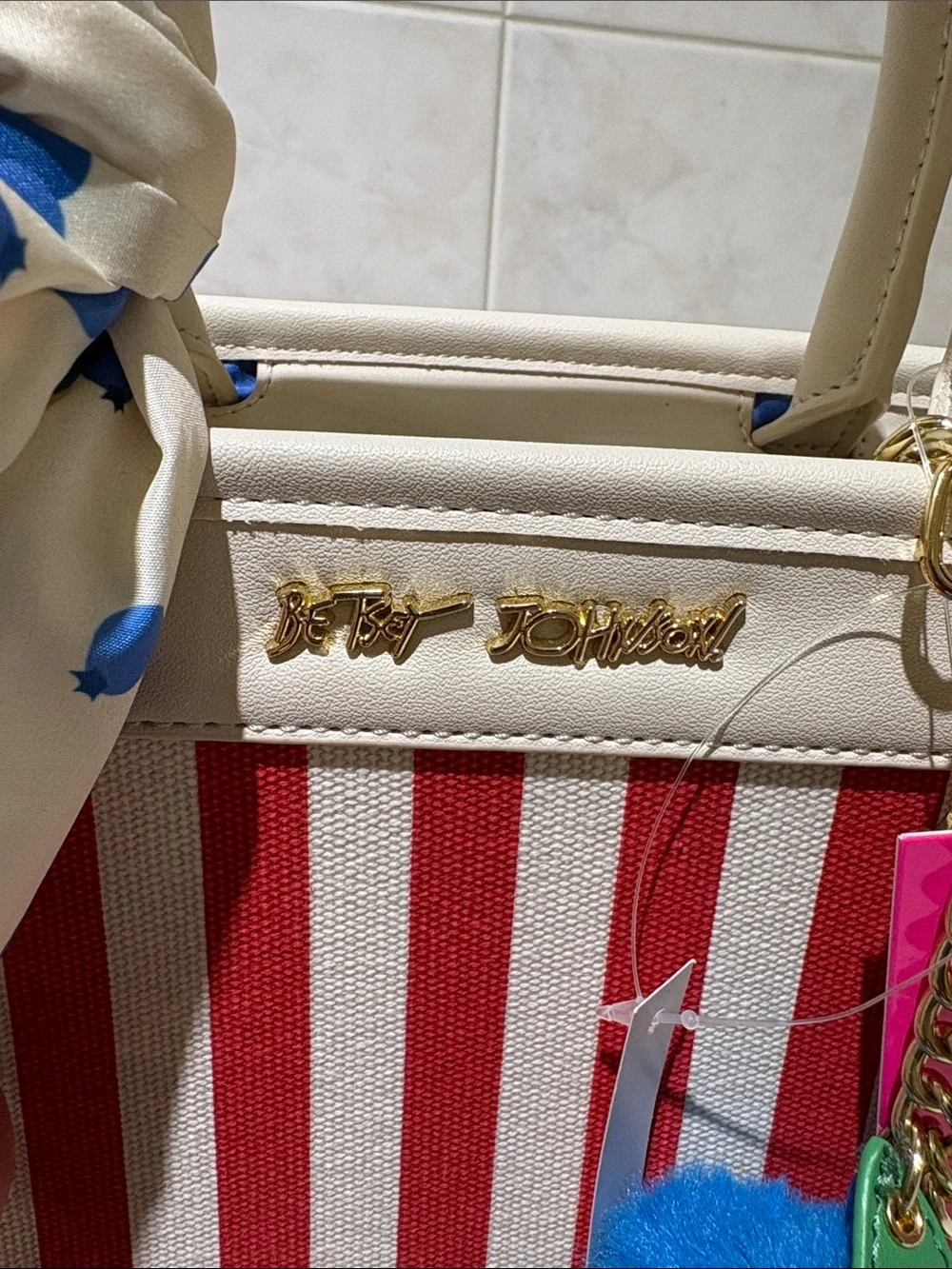 Betsey Johnson Cream and Red Striped Top-Handle Satchel with Blueberry Pom Charm